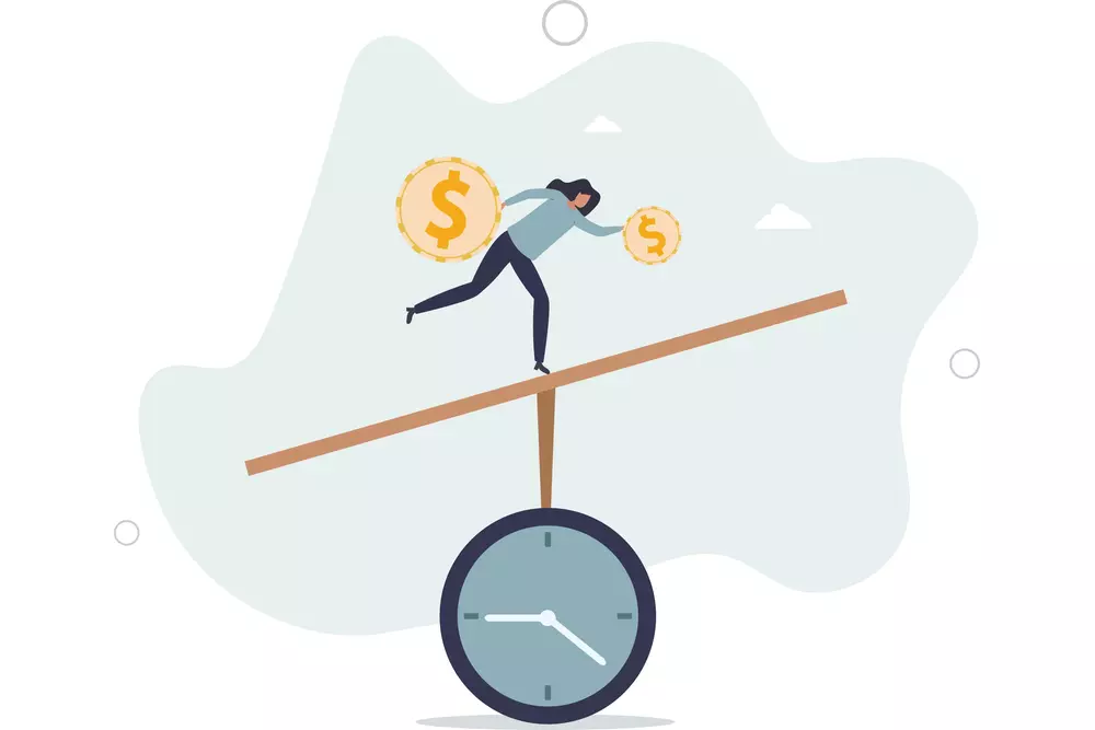 woman holding coins balancing on clock