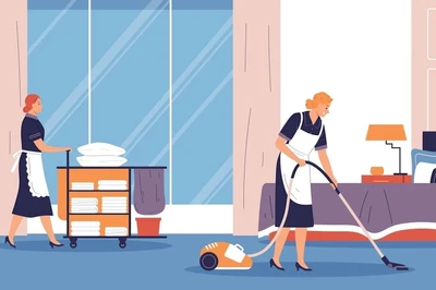 housekeepers cleaning hotel room